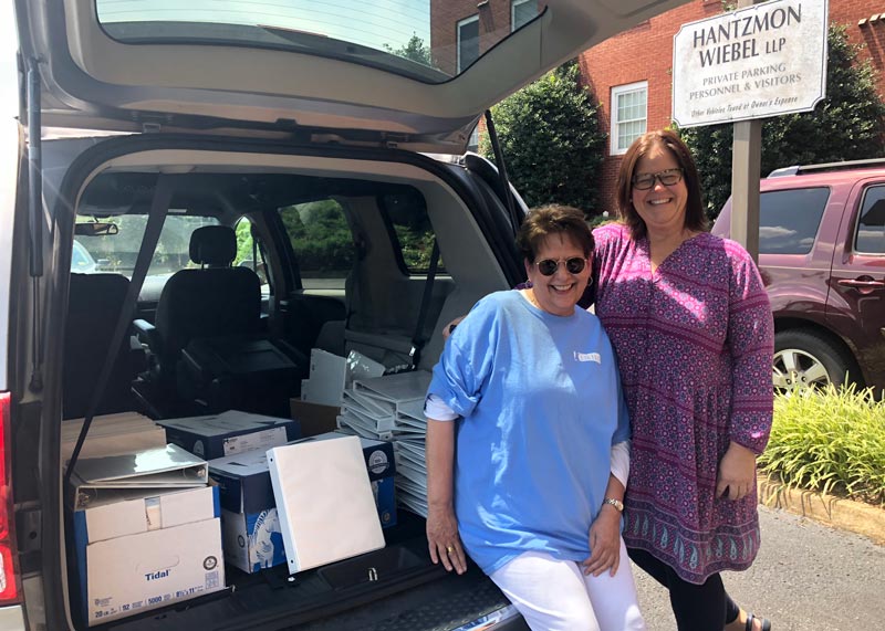 Hantzmon Wiebel Fills Two Cars with School Supplies for Local Students