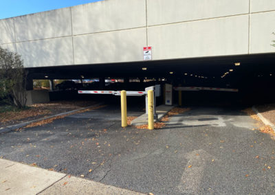 Picture of the parking garage at Hantzmon Wiebel, with two gates on either side.