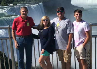 Jennifer Lehman with her father, husband, and son at Niagara Falls