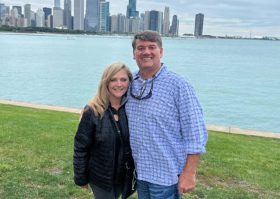 Jennifer Lehman and her husband with the Chicago skyline in the background